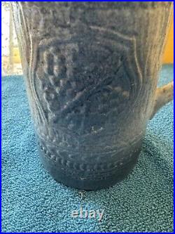 Antique McCoy Pottery 7 Salt Glazed Stoneware Pitcher withMedieval Shield Decor