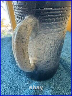 Antique McCoy Pottery 7 Salt Glazed Stoneware Pitcher withMedieval Shield Decor