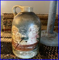 Antique Primitive Small Stoneware Jug withPainting of 2 Children in Boat
