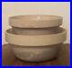 Pair_of_2_Antique_Primitive_Stoneware_Pottery_Nesting_Mixing_Bowls_10_5_9_01_vp